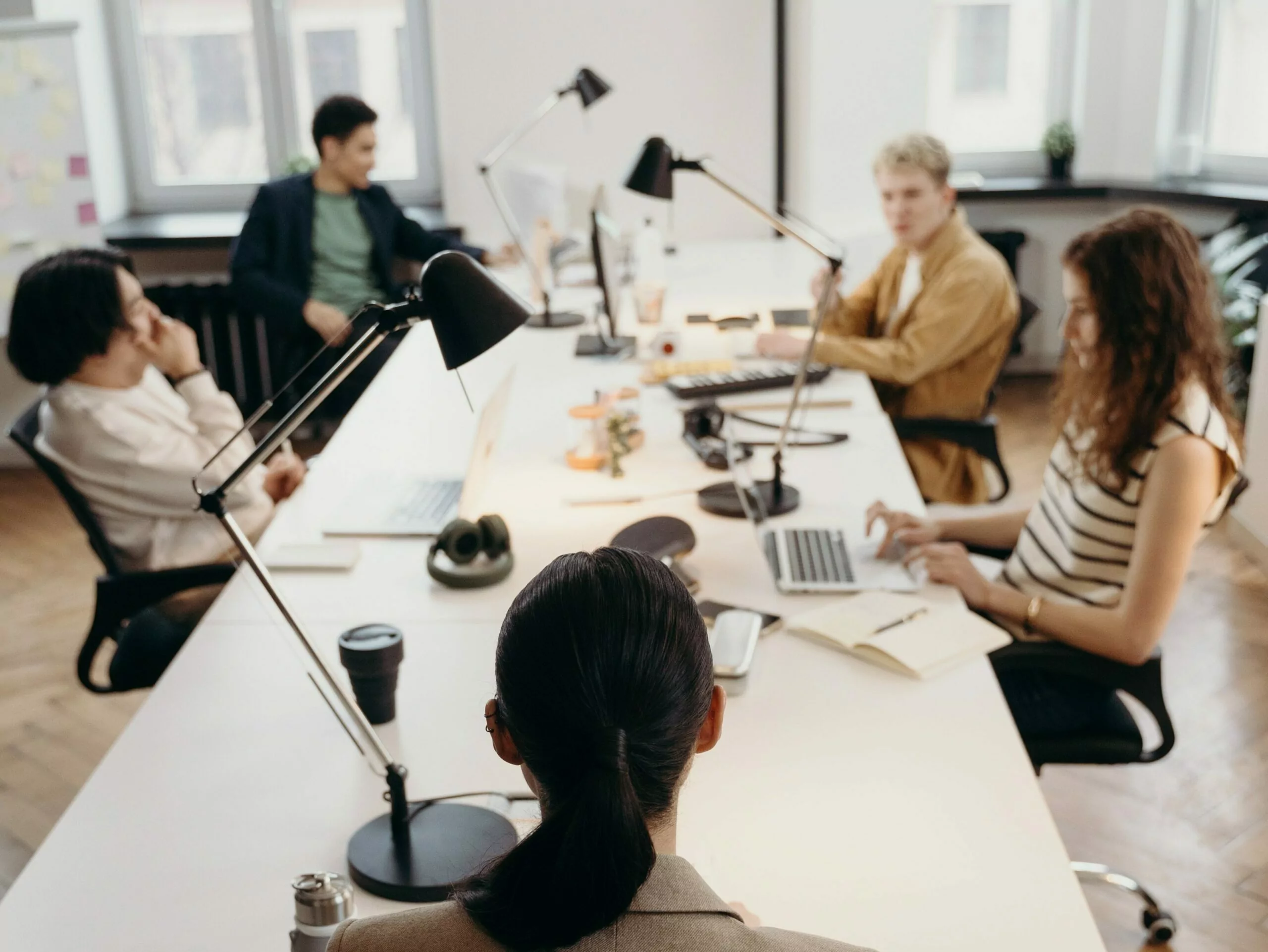 A Product Manager Leading A Meeting With Relevant Teams